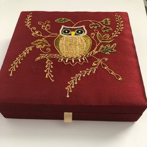 Owl embroidered on red silk and gold inside